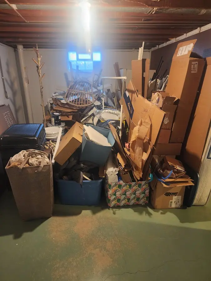 Roll-off dumpster container at job site for Roll Off Dumpster Rental in Bayside